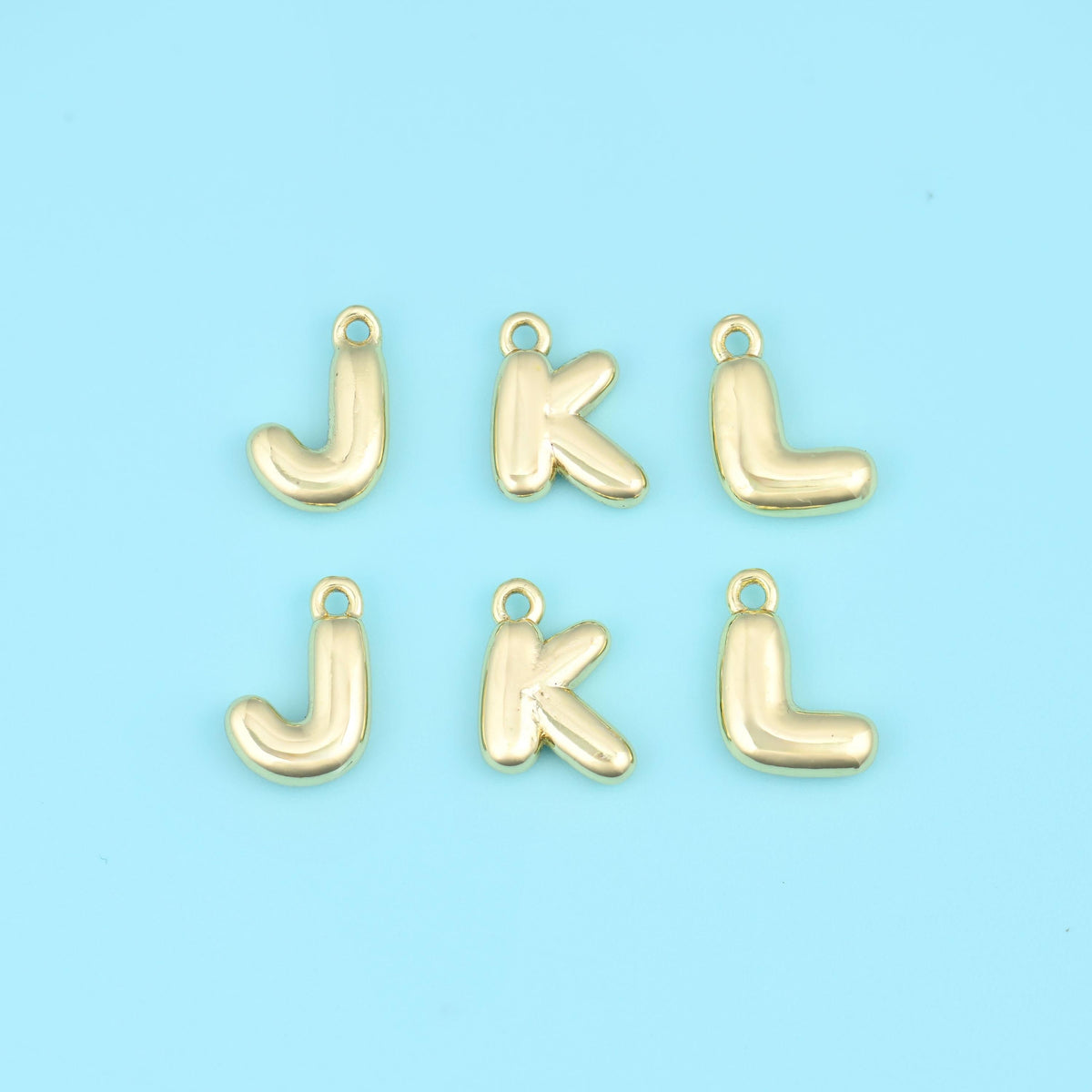 18K gold plated letter pendants J, K and L, puffed alphabet initials with a hanging loop on each.
