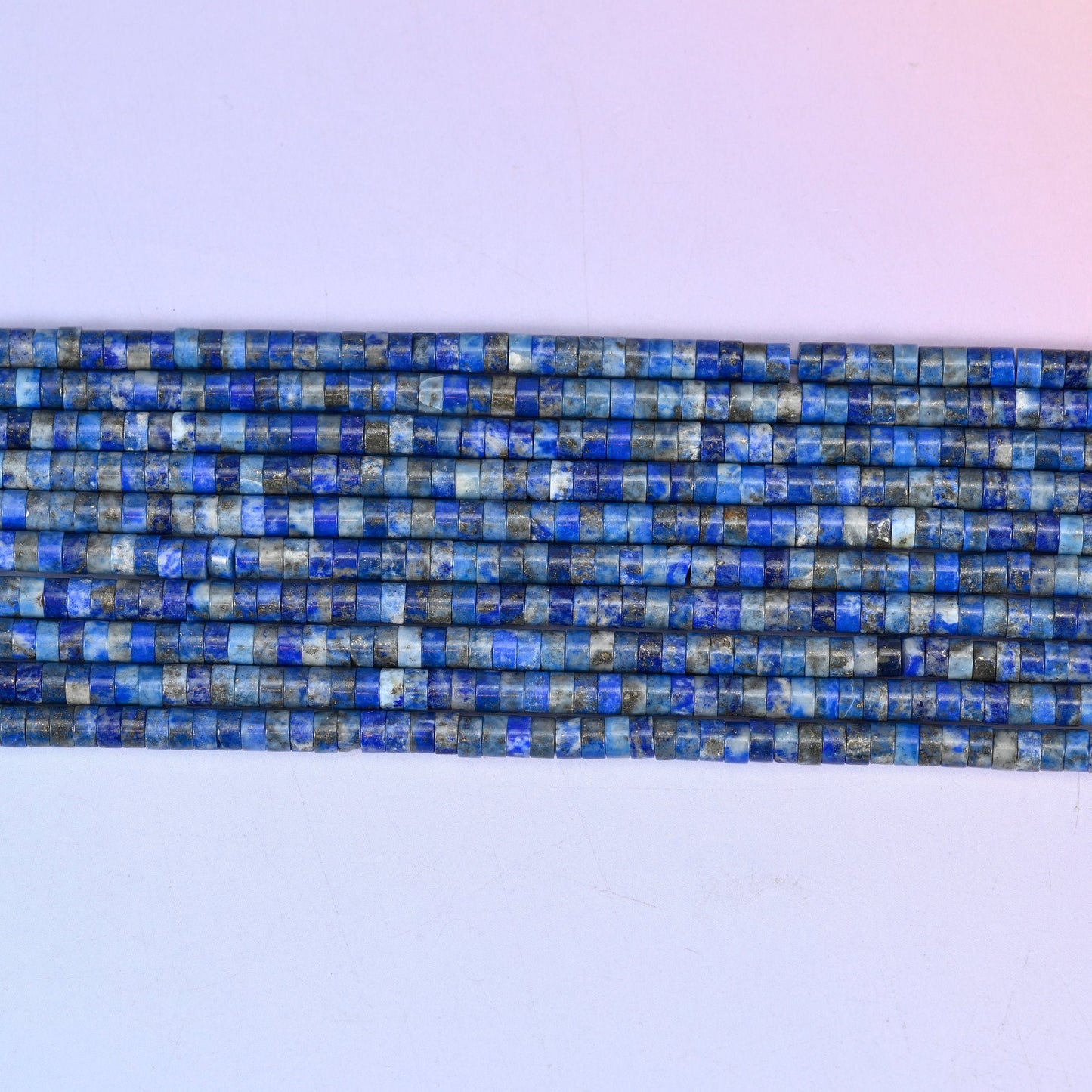 Lapis Lazuli Smooth Heishi Disc Beads in deep blue with golden pyrite flecks