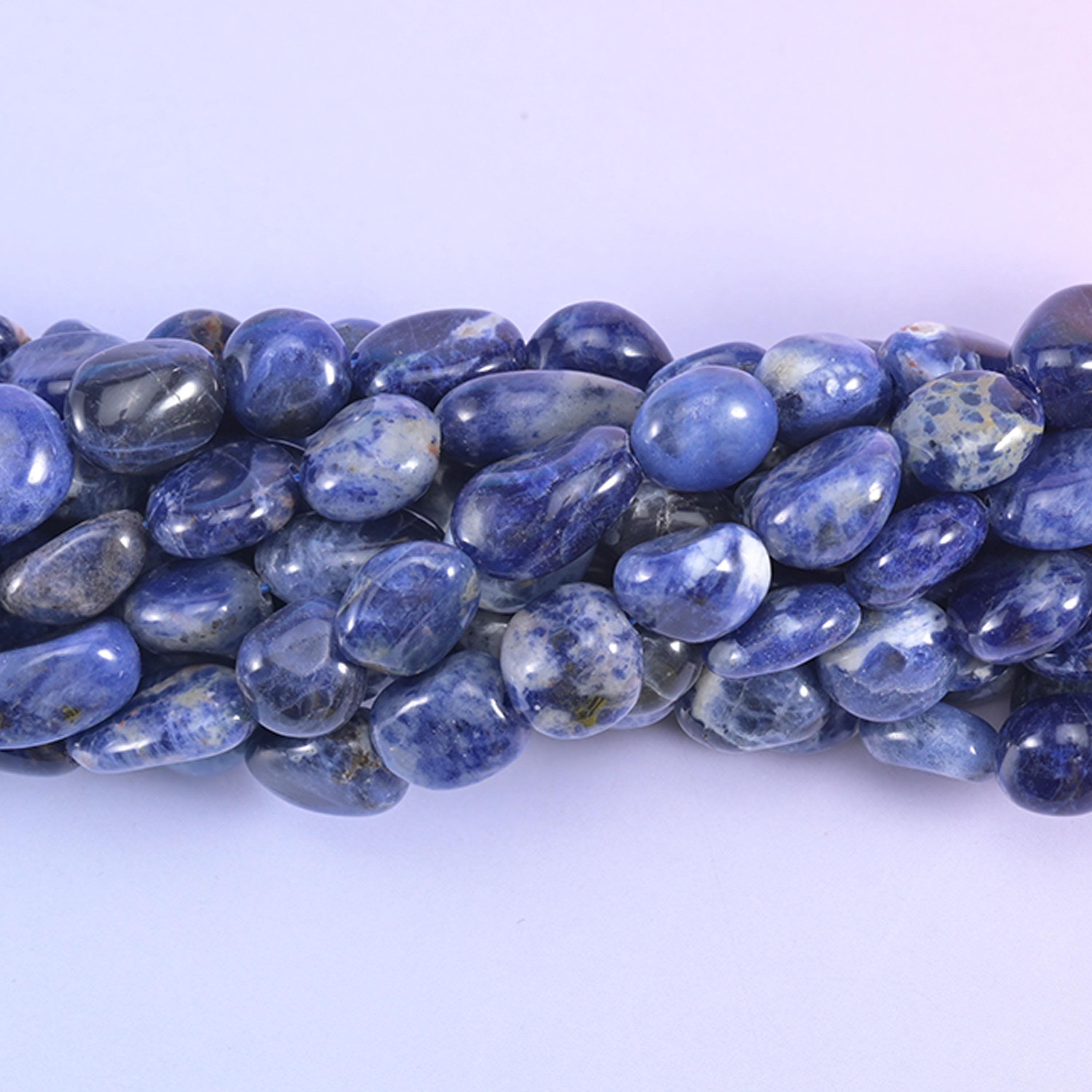 Close view of larger Sodalite nuggets with bold white streaking
