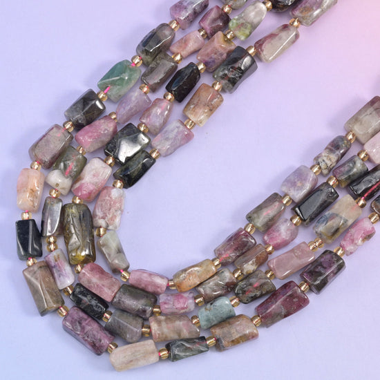 Multi-Color Tourmaline irregular faceted tube beads, a luxurious gemstone with a sleek, modern silhouette