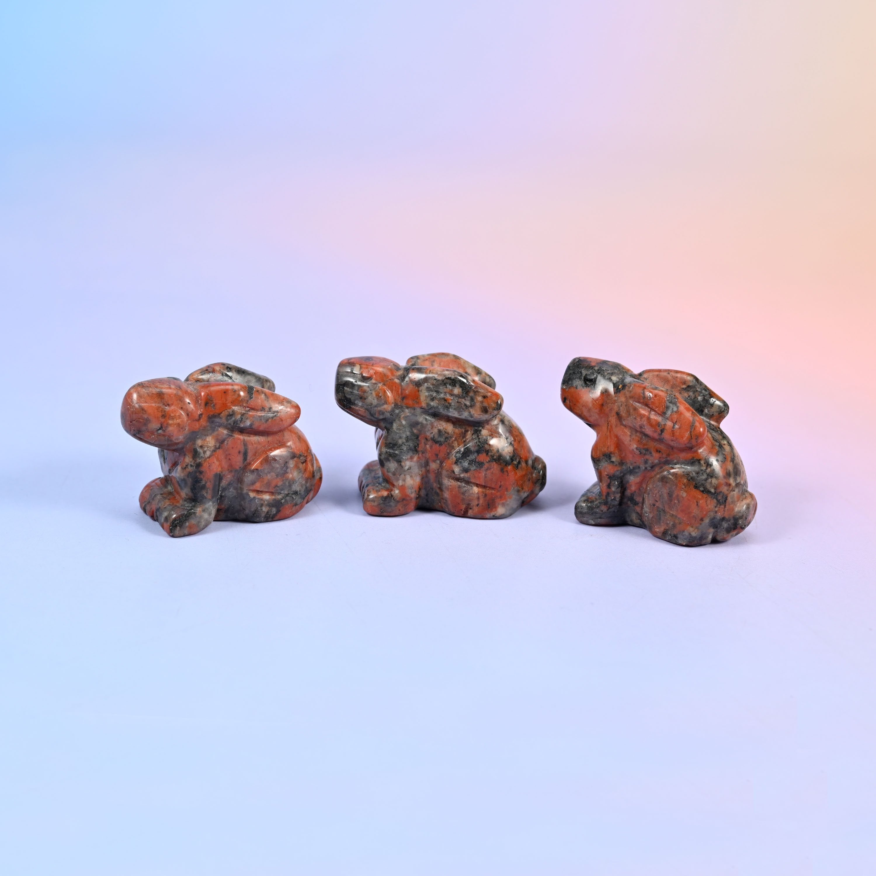 1.5 inch carved stone rabbit figurine, natural stone so veining and colour vary piece to piece