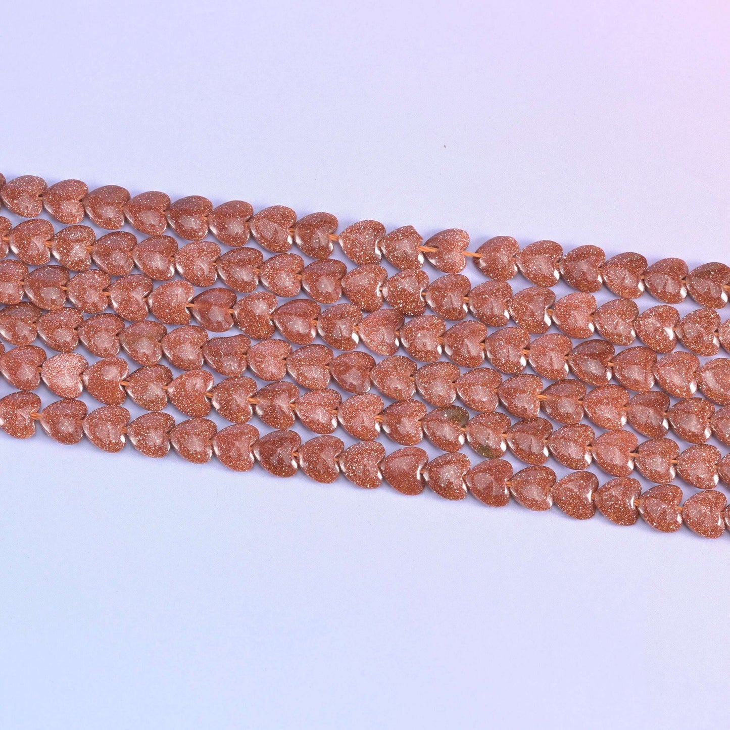 Gold Sandstone Heart Beads in coppery-brown with fine gold glitter