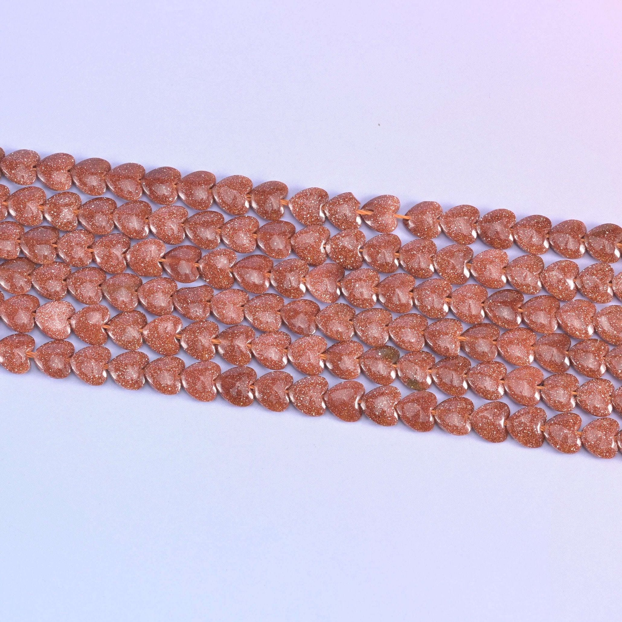 Gold Sandstone Heart Beads in coppery-brown with fine gold glitter