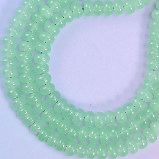 Light Green Dyed Jade rondelle beads, approximately 75 beads per strand
