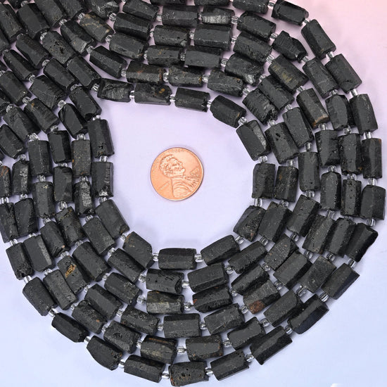 Natural Raw Black Tourmaline faceted tube beads — a sleek, contemporary cylinder shape with a sophisticated, modern look, perfect for handmade jewelry designs.