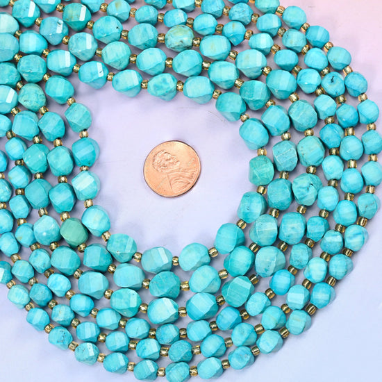 Dyed Lake Blue Howlite Faceted Spiral Twist Beads, soft turquoise lake blue lifted by pale chalky veining