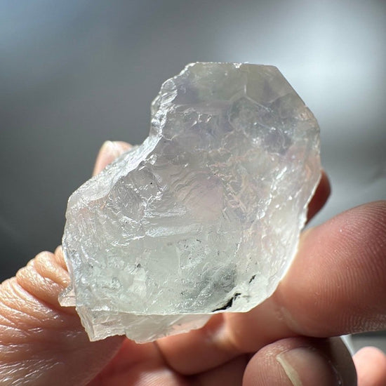Rear face of the fluorite specimen with a frosted, naturally broken edge