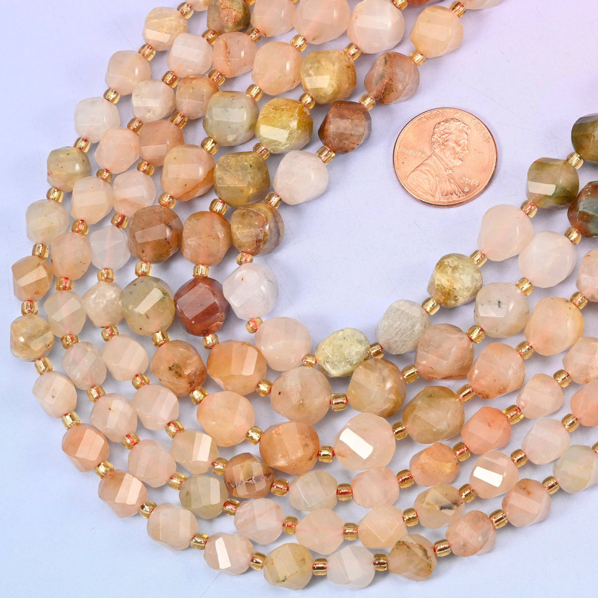 Faceted spiral twist cut Red Grass Silk Stone beads
