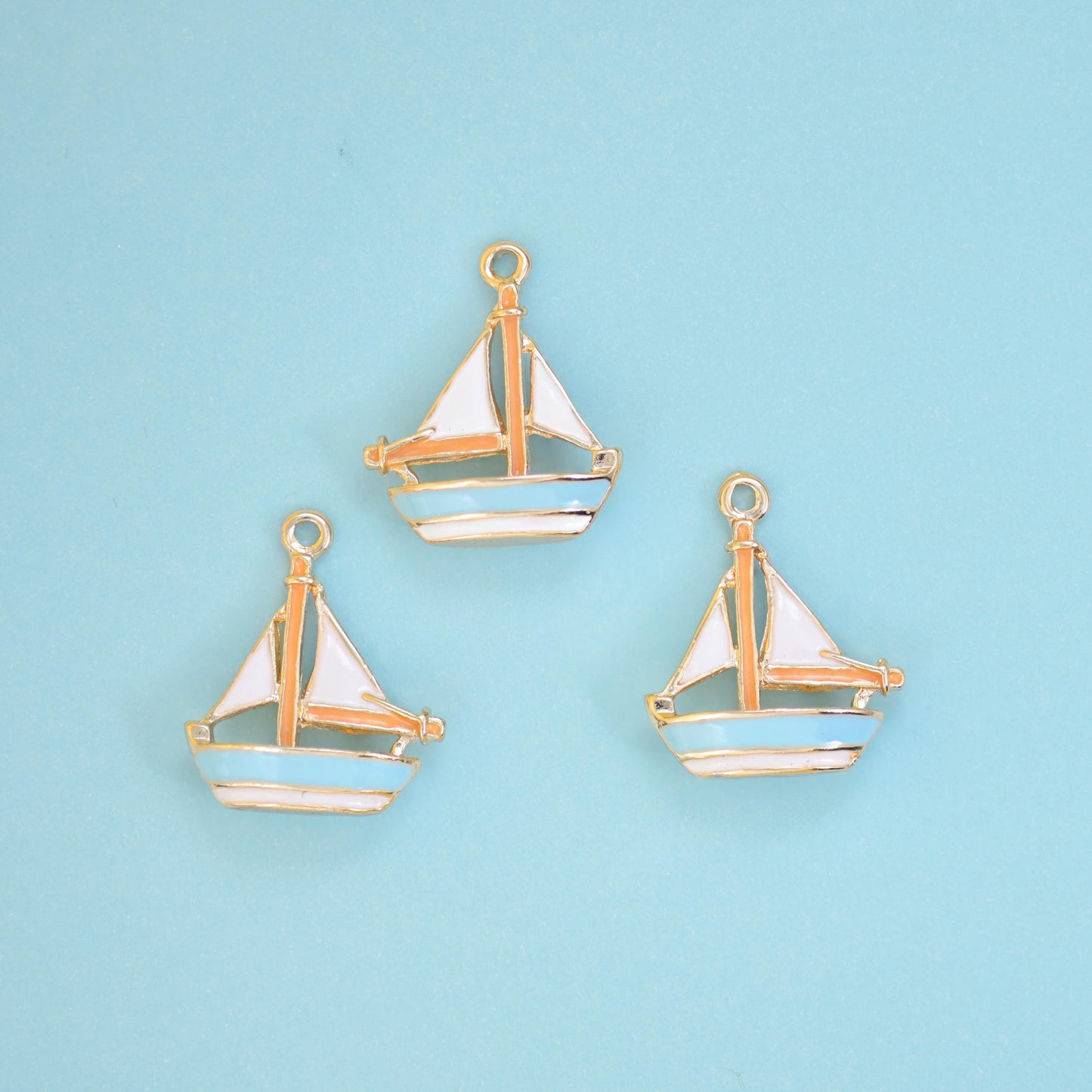 Brass, 18K gold filled, beads, sailboat, 19 x 15mm