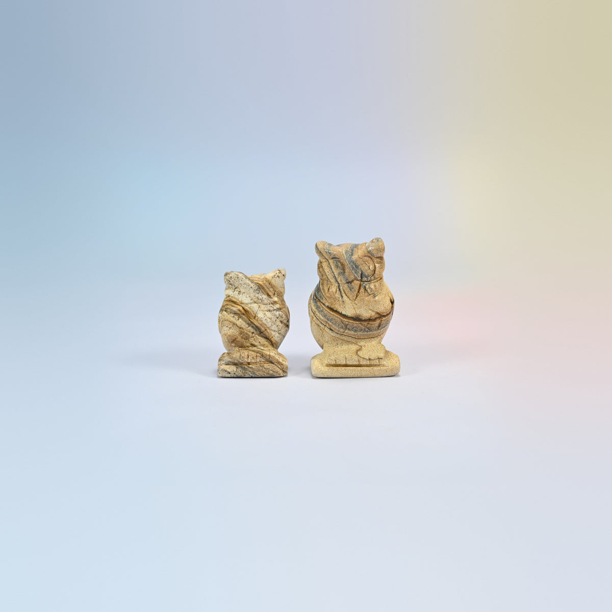 Owl crystal carving in picture jasper, tan natural stone with brown bands