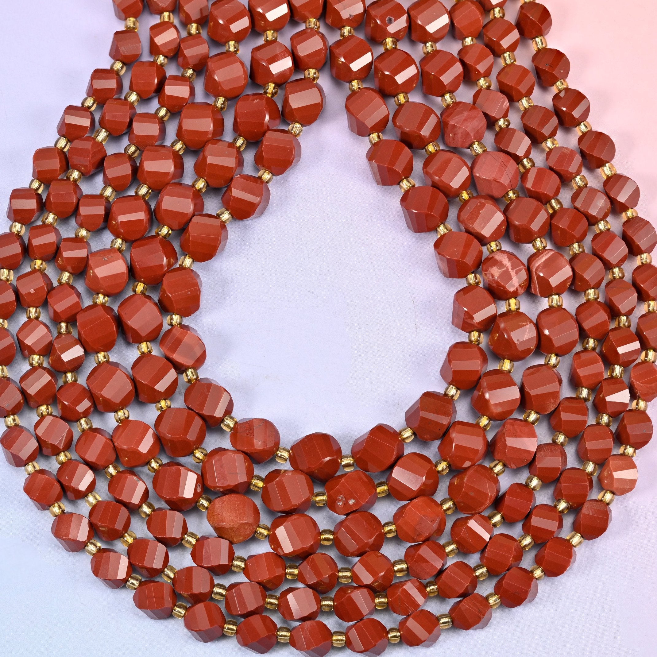 Red Jasper spiral twist beads, drill hole approximately 1.2mm, centre-drilled.