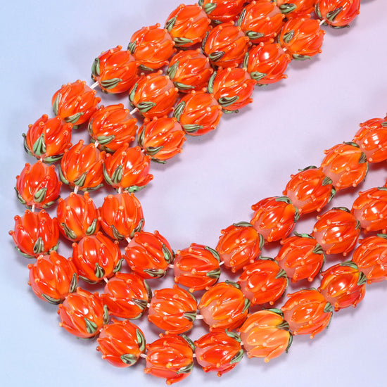 Orange tulip flower bud lampwork glass beads, 11 inch strand