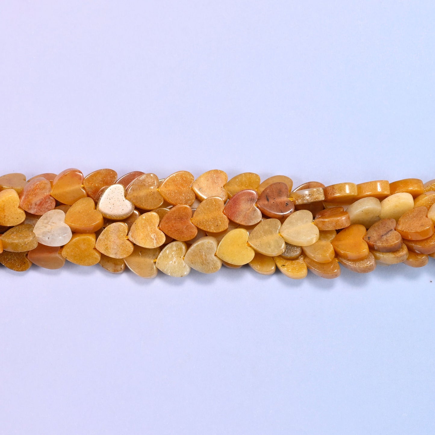 Gold Silk Jade Flat Heart Beads, approximately 68 beads per strand