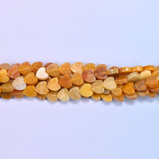 Gold Silk Jade Flat Heart Beads, approximately 68 beads per strand