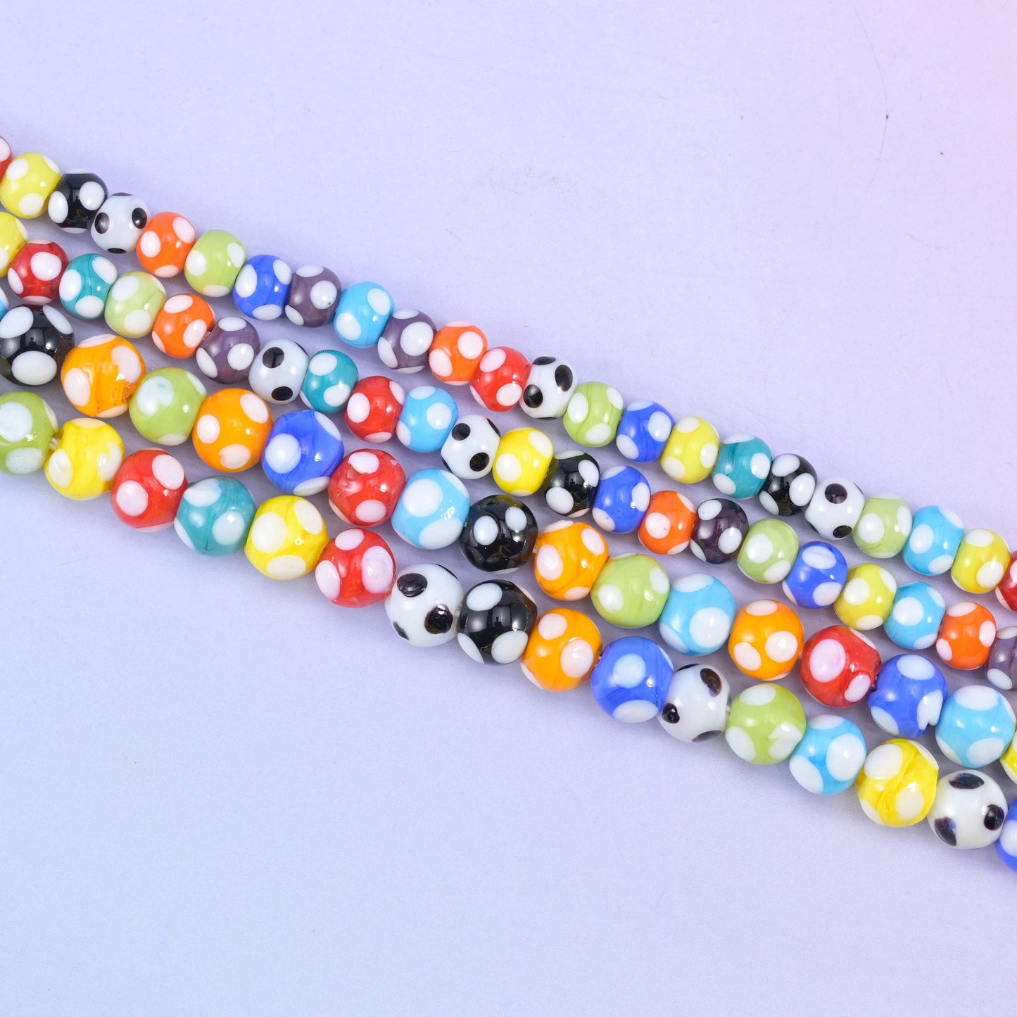 Multi-Color Spotted Round Glass Beads, each dotted with contrasting spots like a handful of marbles