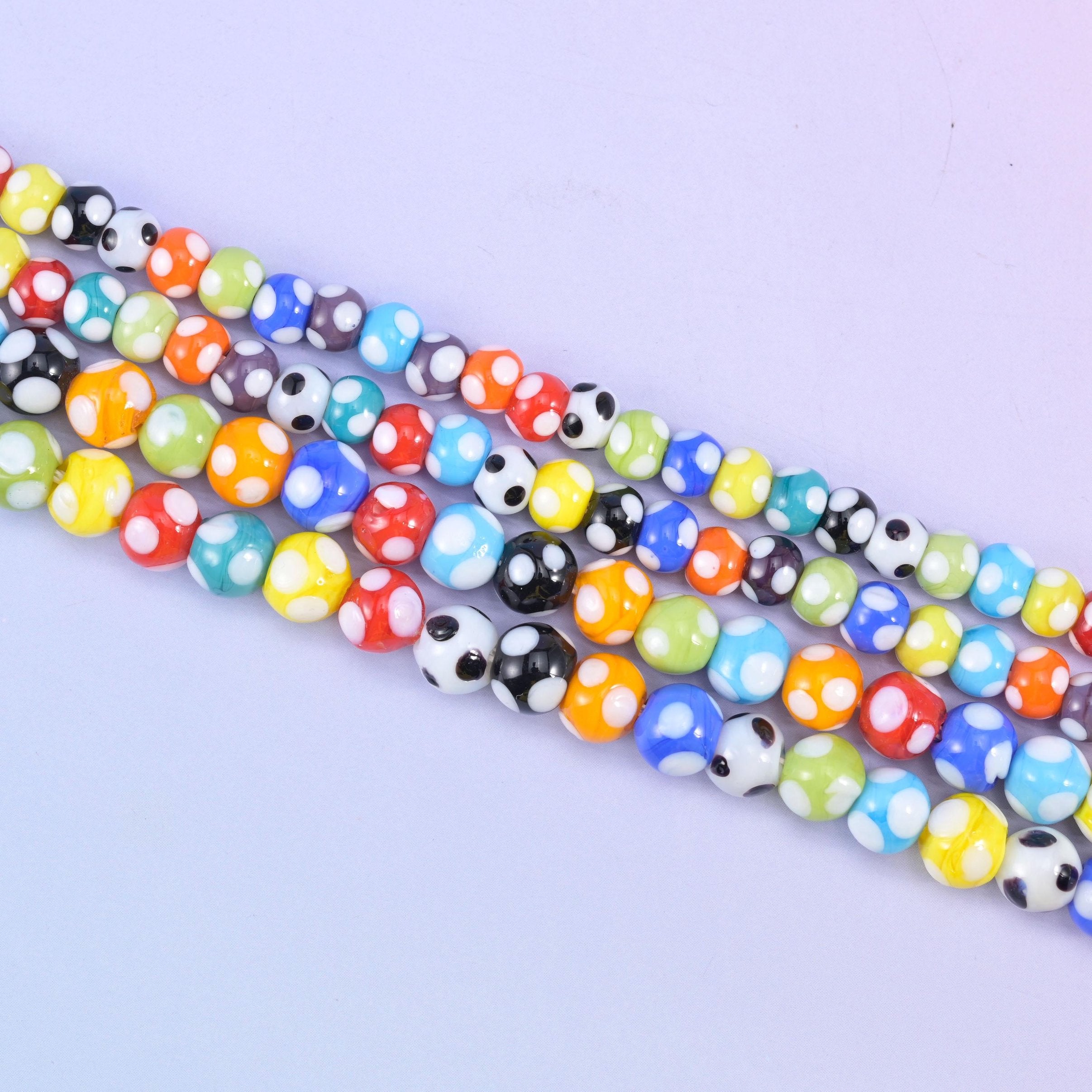 Multi-Color Spotted Round Glass Beads, each dotted with contrasting spots like a handful of marbles