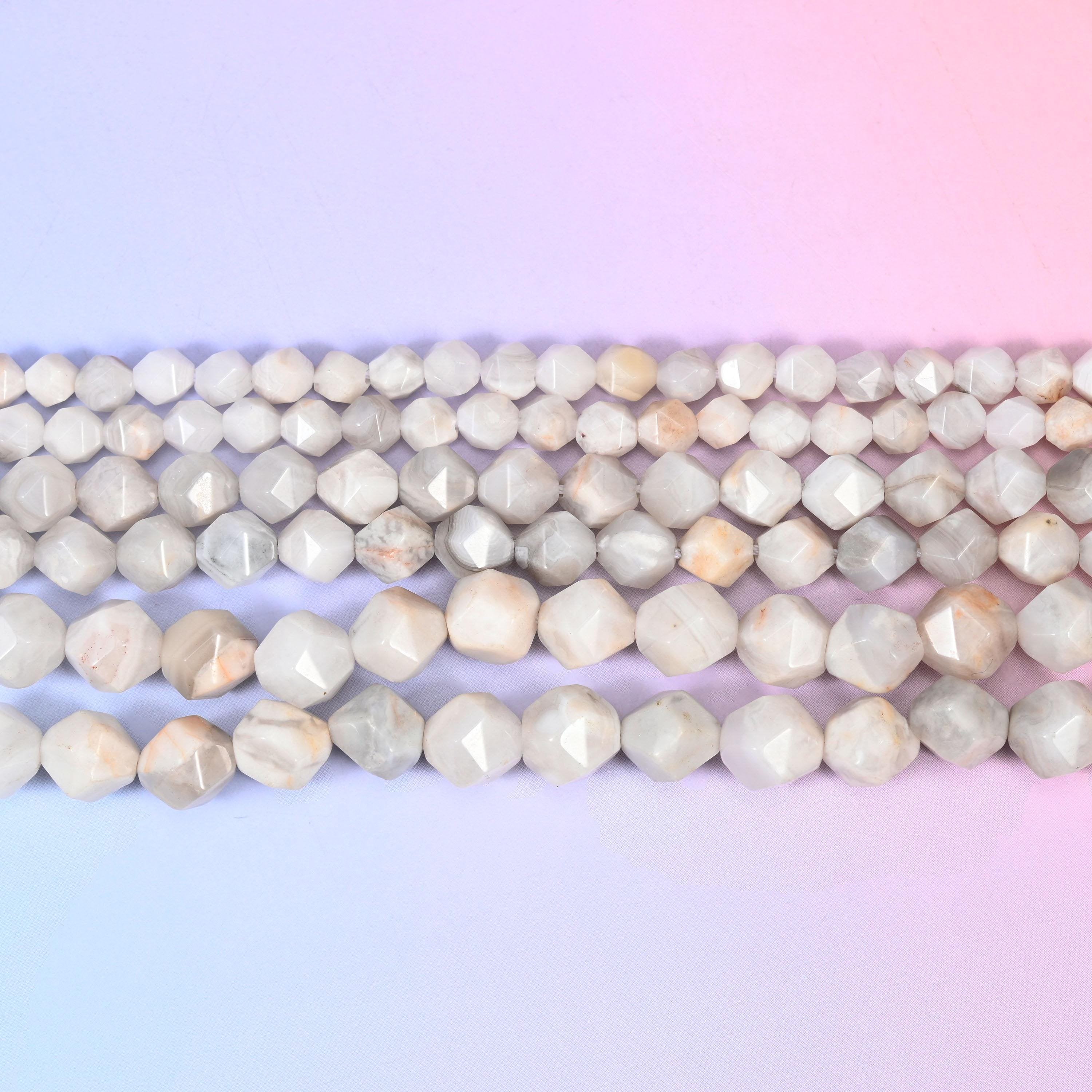 White Crazy Agate in chalky cream and soft dove grey with faint peach patches