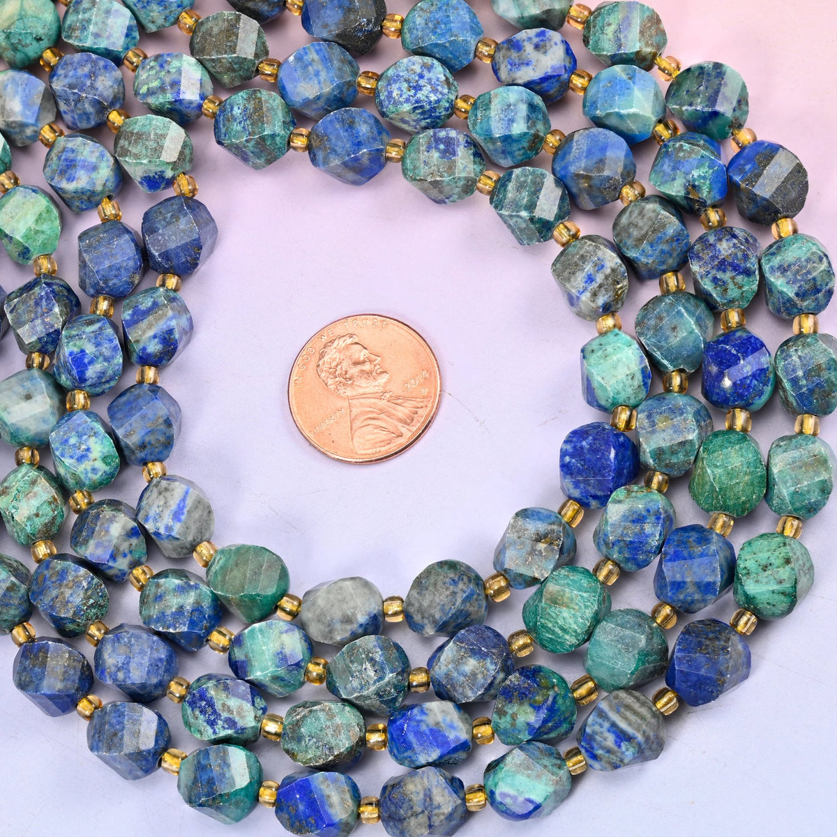 Phoenix Lapis lapis lazuli beads, 10mm faceted spiral twist beads on a full 15 inch strand