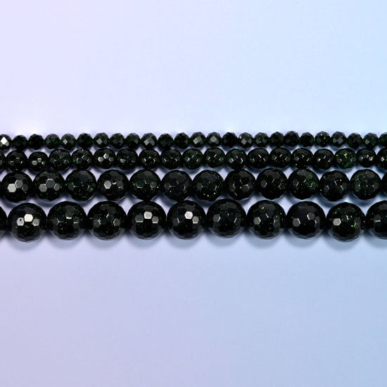 Green Sandstone Faceted Round Beads in deep bottle-green with copper glitter
