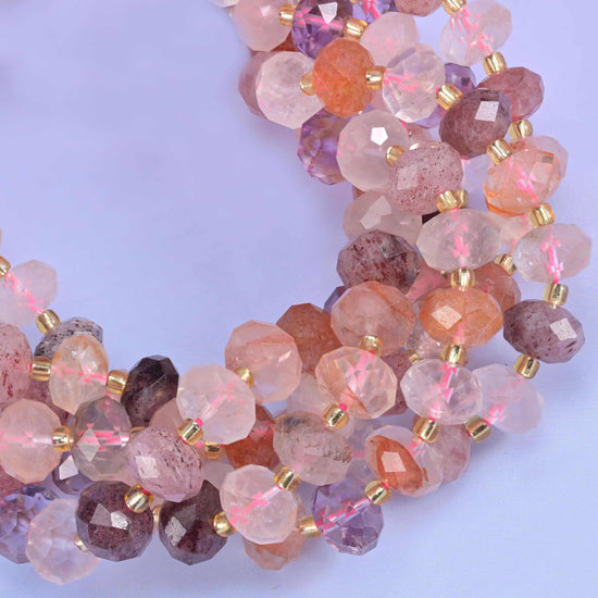 Faceted rondelle cut strawberry phantom quartz beads