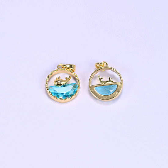 Textured round frame cut whale charm pendant