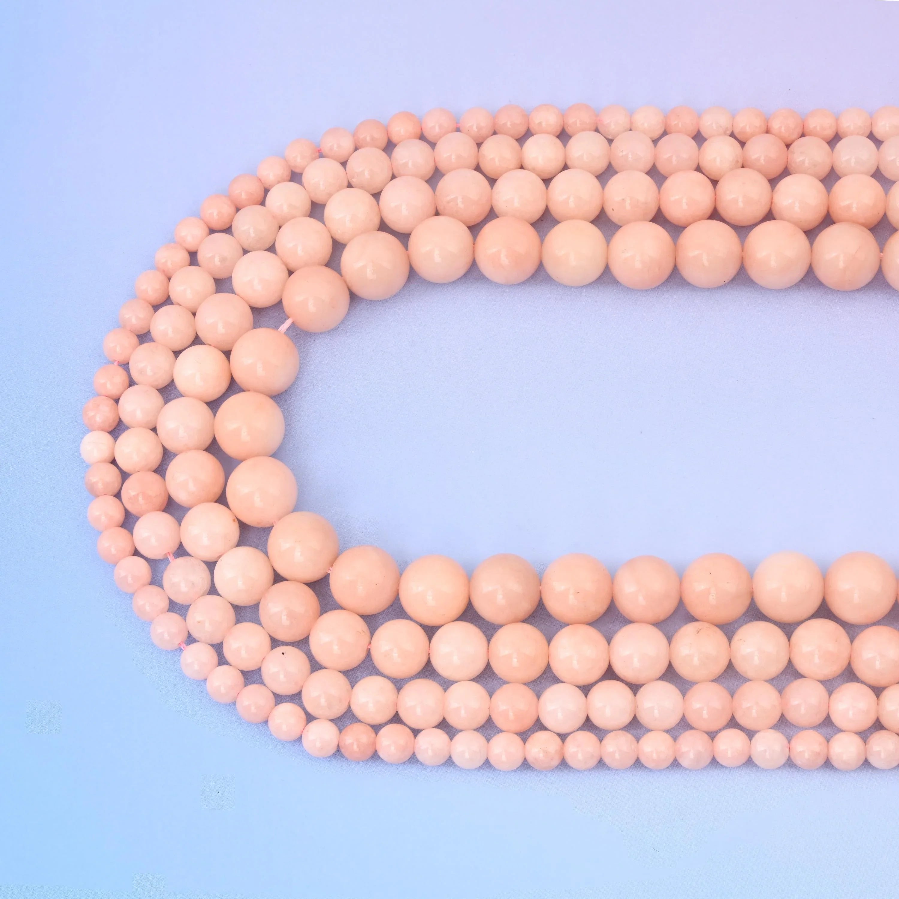 Pink Dyed Jade beads in soft pastel pink