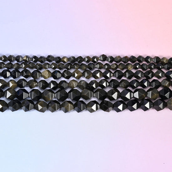 Gold Obsidian in near-black stone with a warm bronze-gold sheen