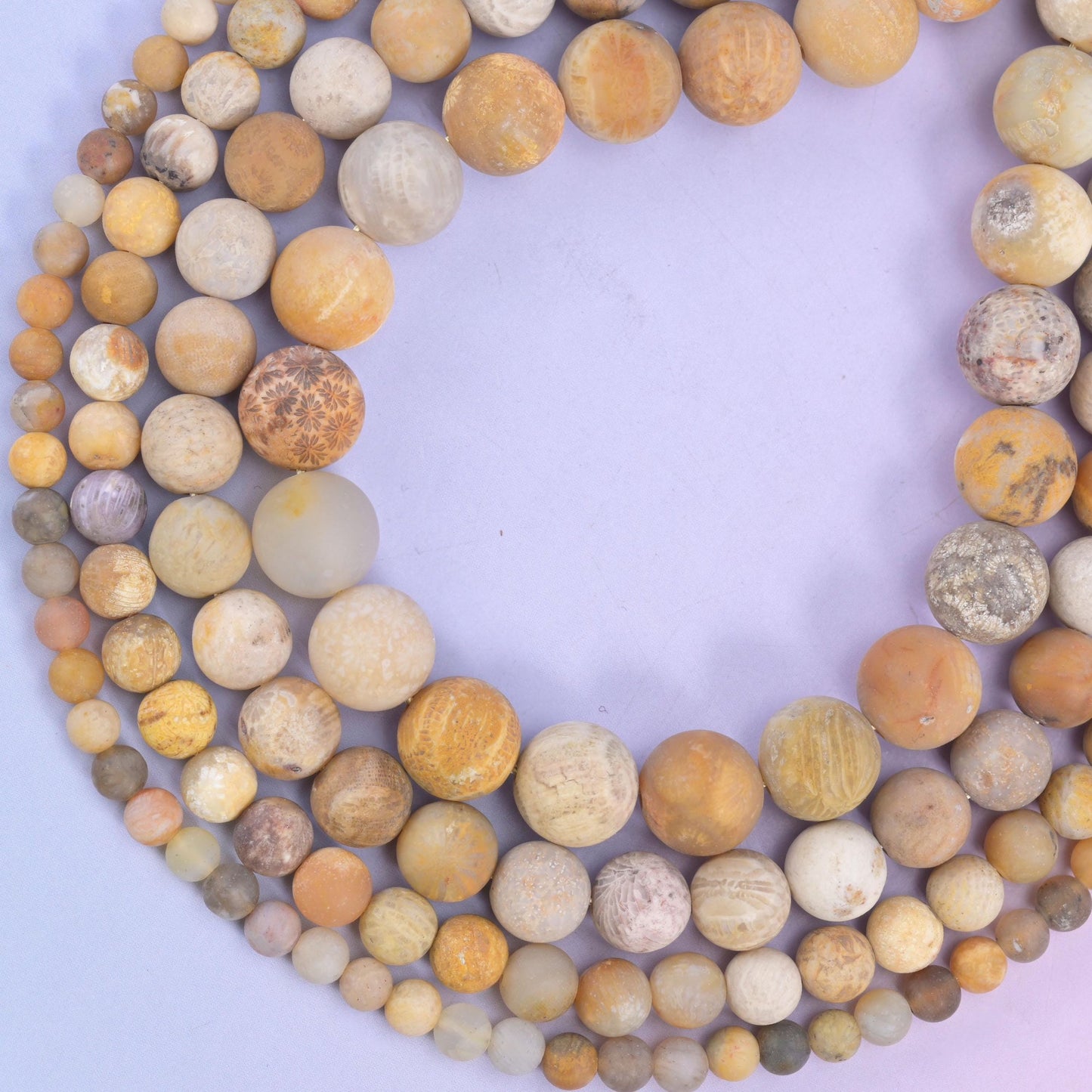 Fossil Coral round beads, up to 85 beads per strand