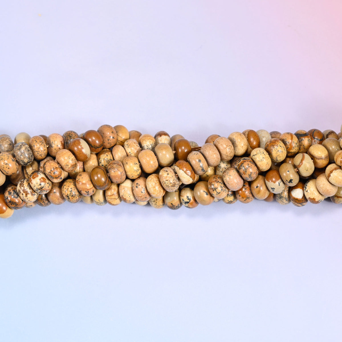 Natural Picture Jasper rondelle beads in warm tan, cream and rich brown tones with landscape-like banding.