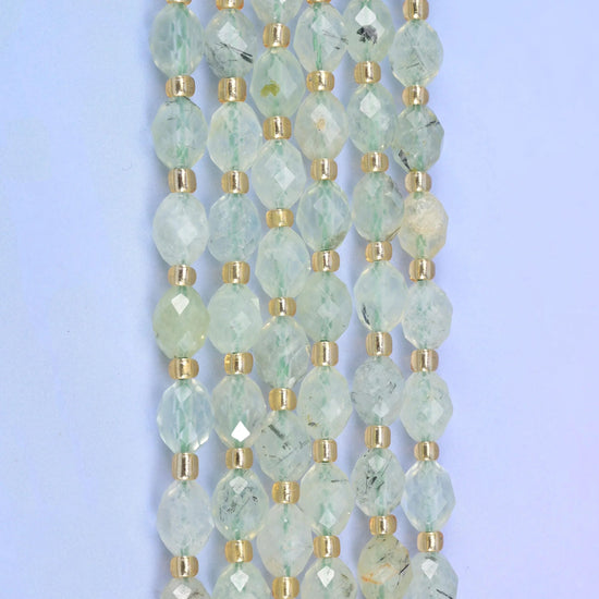 Faceted rice barrel cut light green prehnite beads