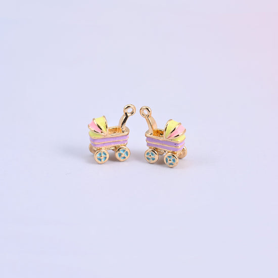 Two light purple stroller charms with yellow and pink striped hoods and light blue flower-spoke wheels.