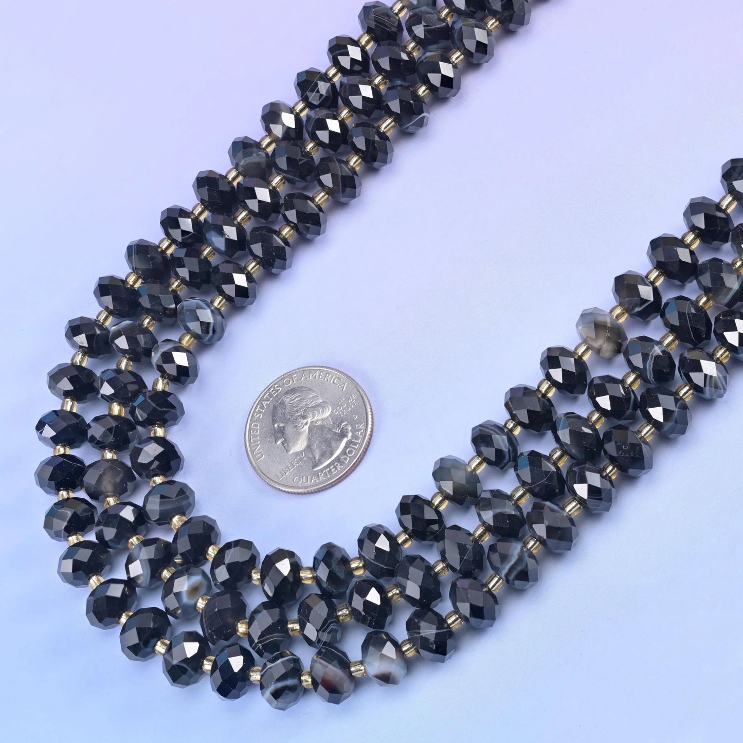 Black Stripe Agate Faceted Rondelle Beads 6x10mm in smoky charcoal with paler grey banding and translucent zones
