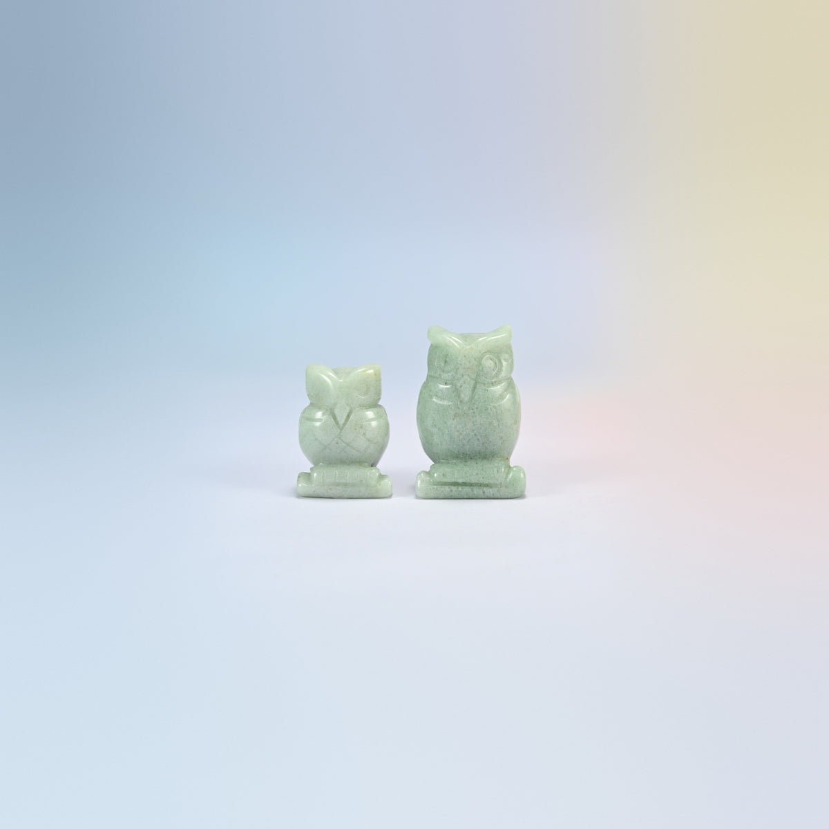 Owl crystal carving in green aventurine, soft green natural stone