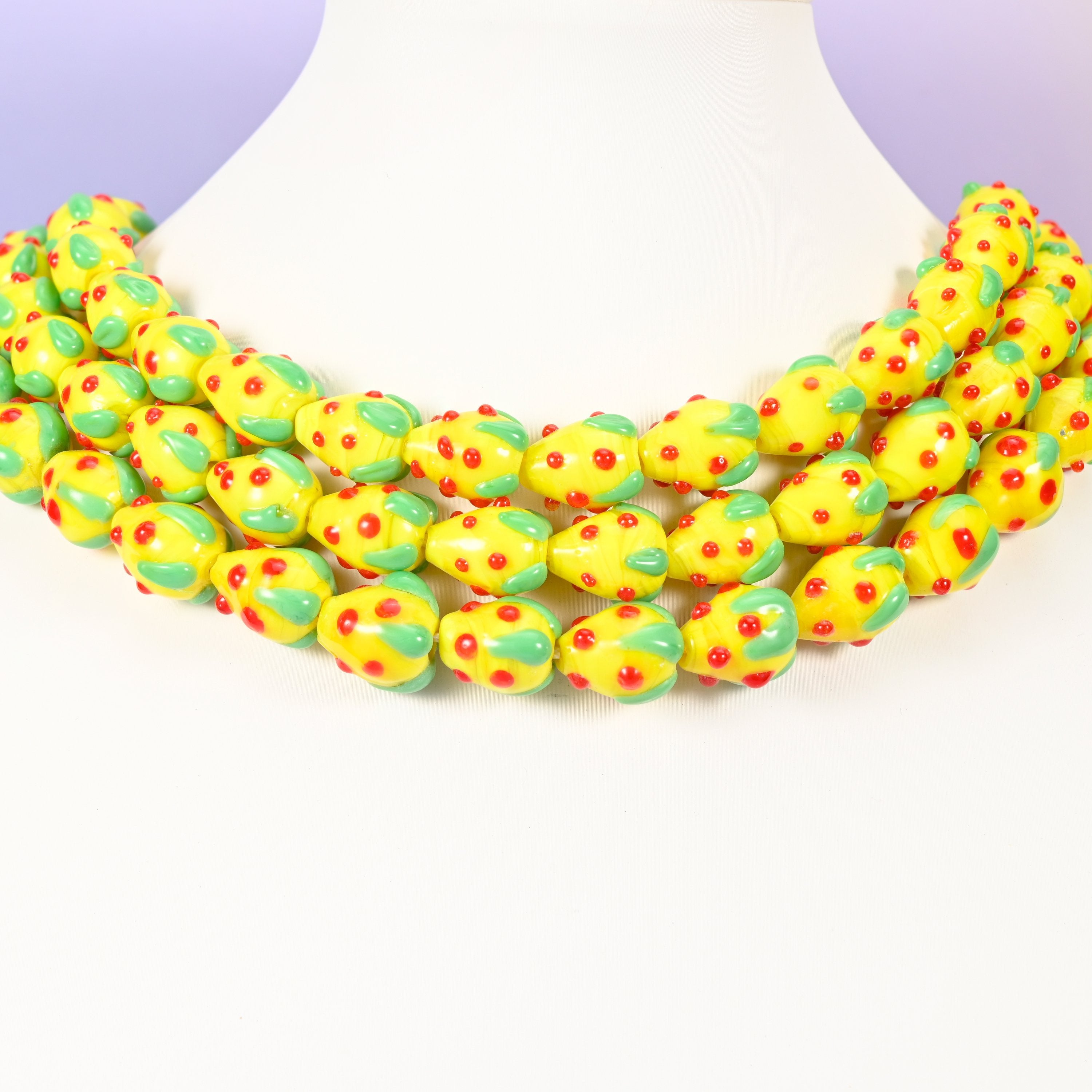 Strawberry glass beads, yellow with red dots, approximately 15.5x12mm