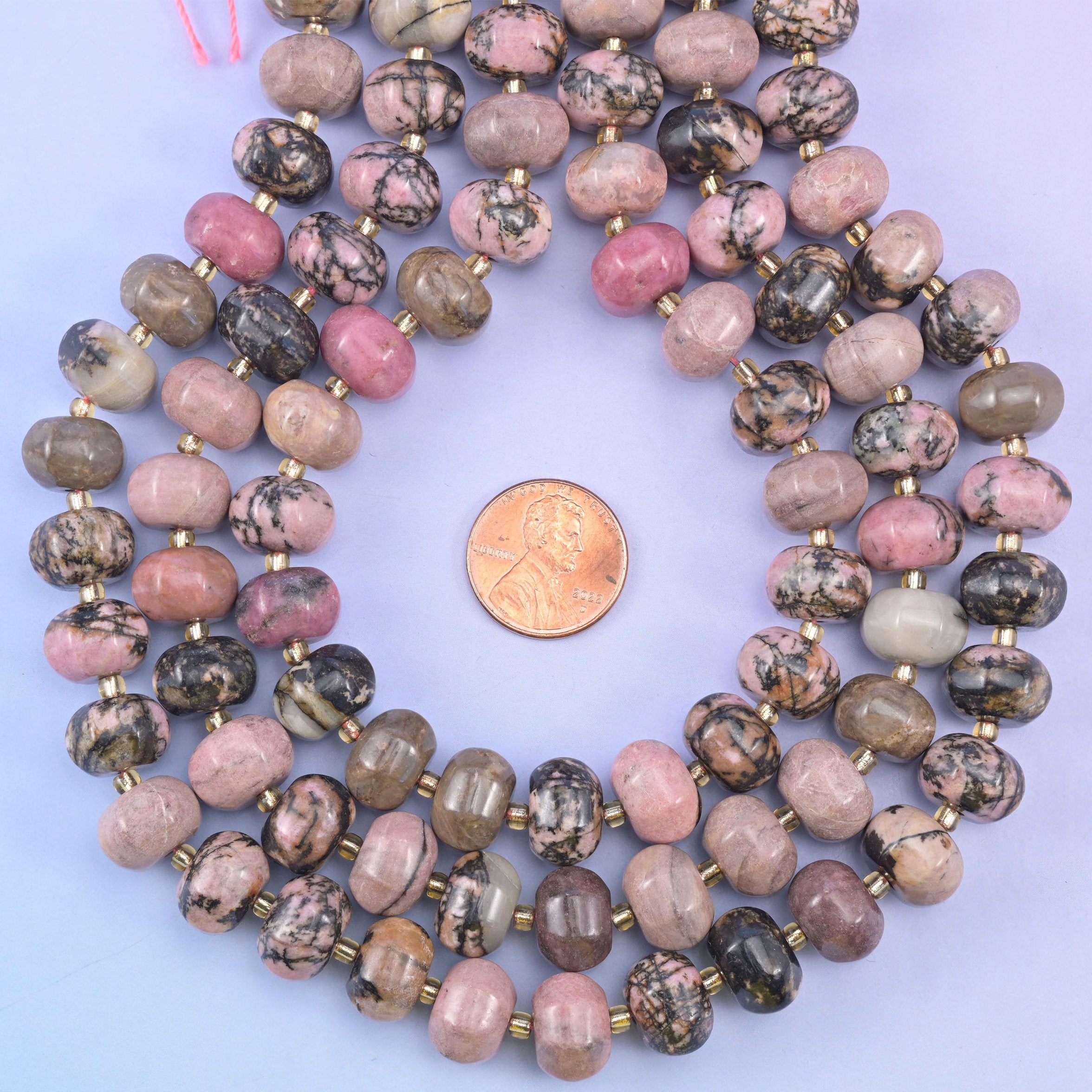 Rhodonite pumpkin beads, approximately 35 beads per strand