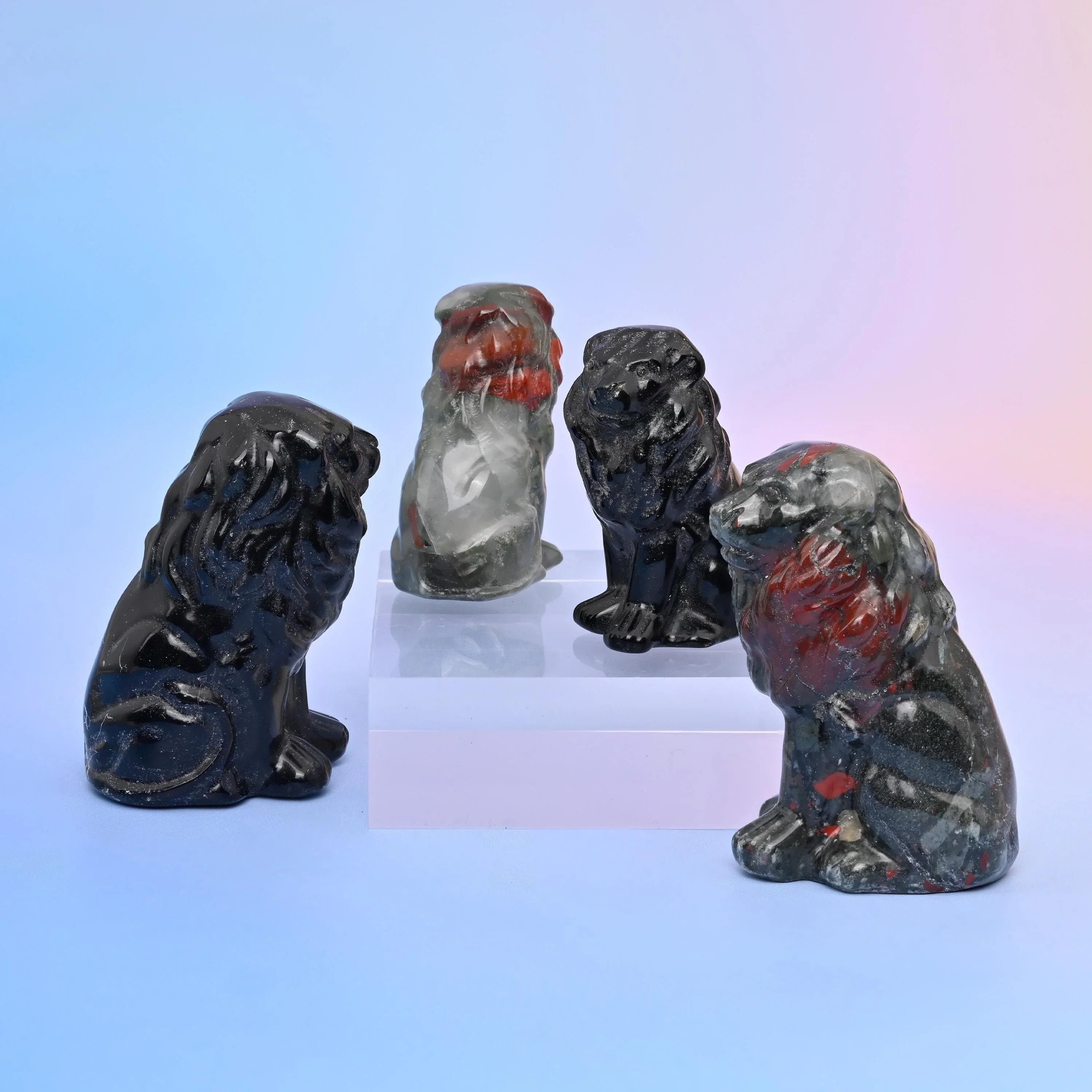 Lion Crystal Carving in sage green aventurine, red jasper, grey labradorite and ocean jasper.