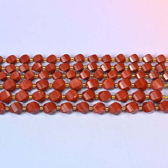 Red Jasper spiral twist beads with facets that wind around the bead and flash lighter terracotta.