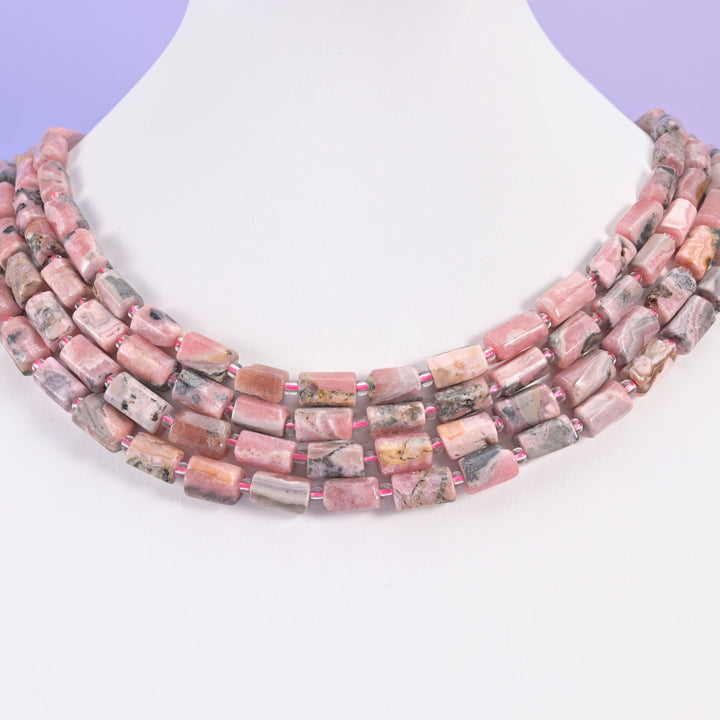 Pink Rhodonite beads, faceted tube shape, 12x8mm.