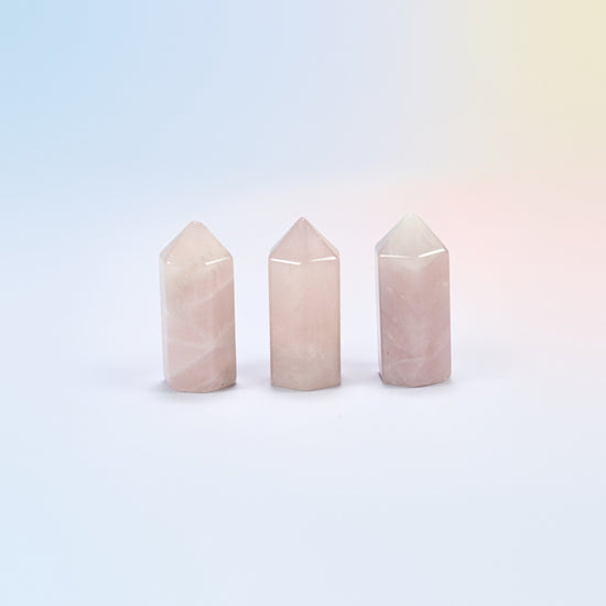 Three natural rose quartz small hexagon crystal points, light pink