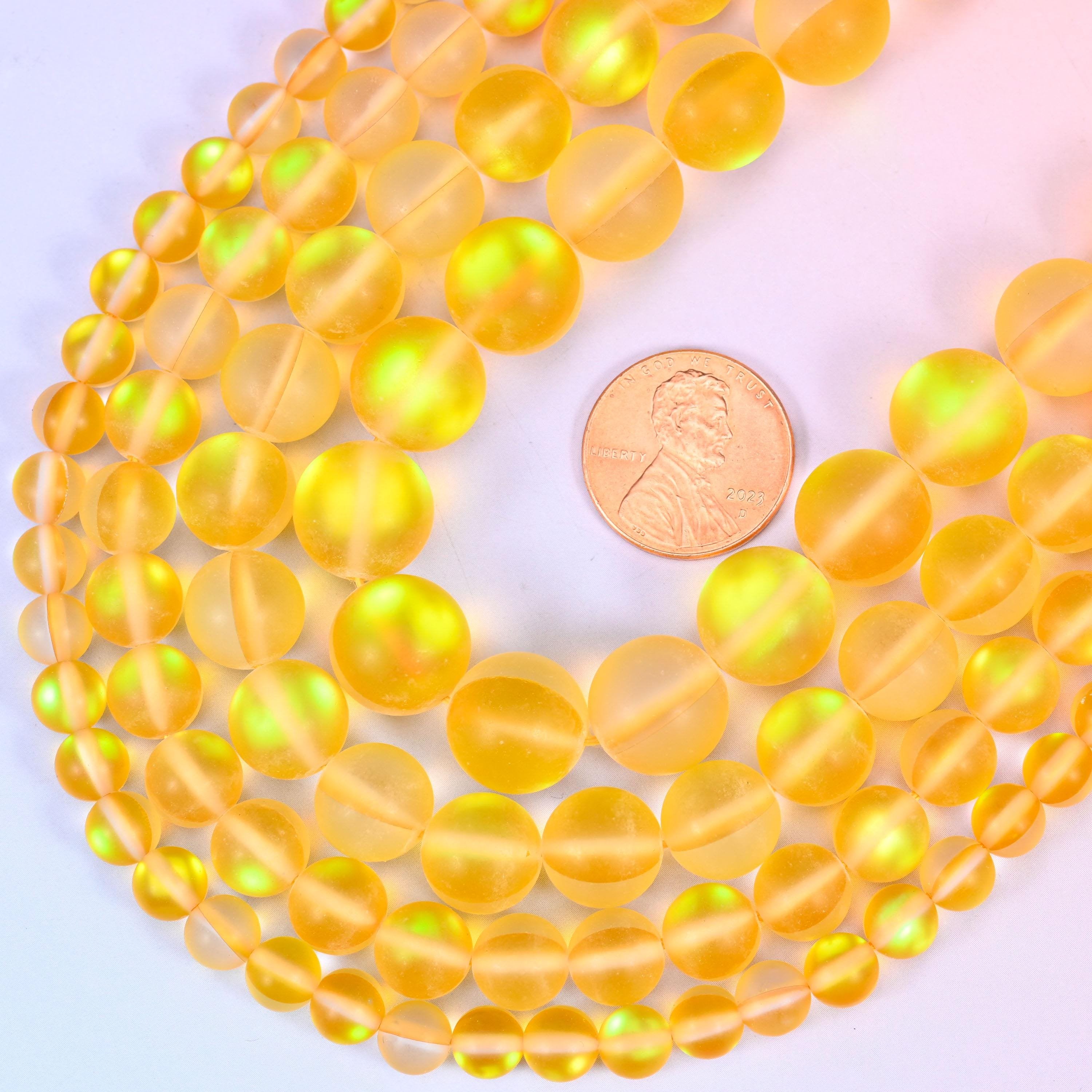 Round frosted yellow glass beads with sea-glass surface