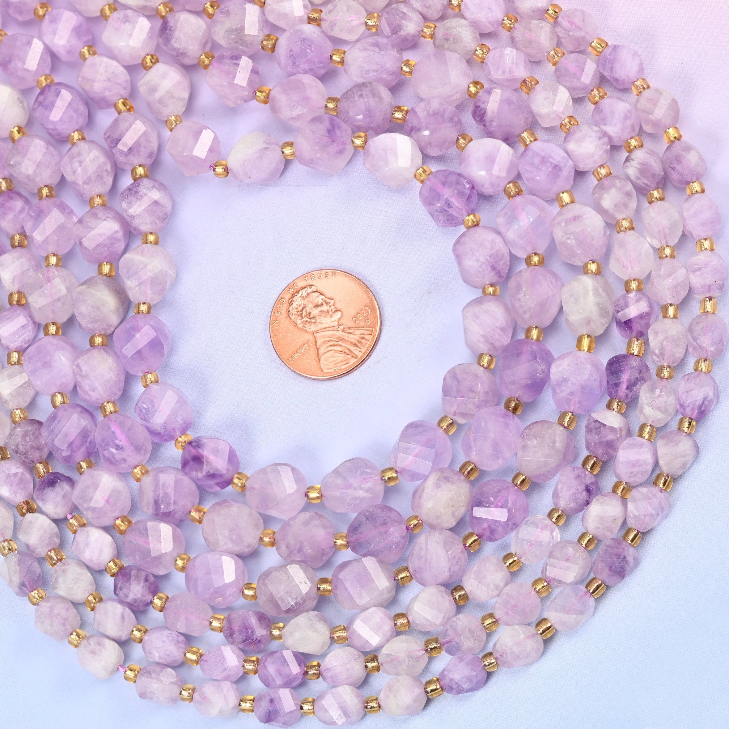 Natural Purple Jade with gold-tone spacers between beads