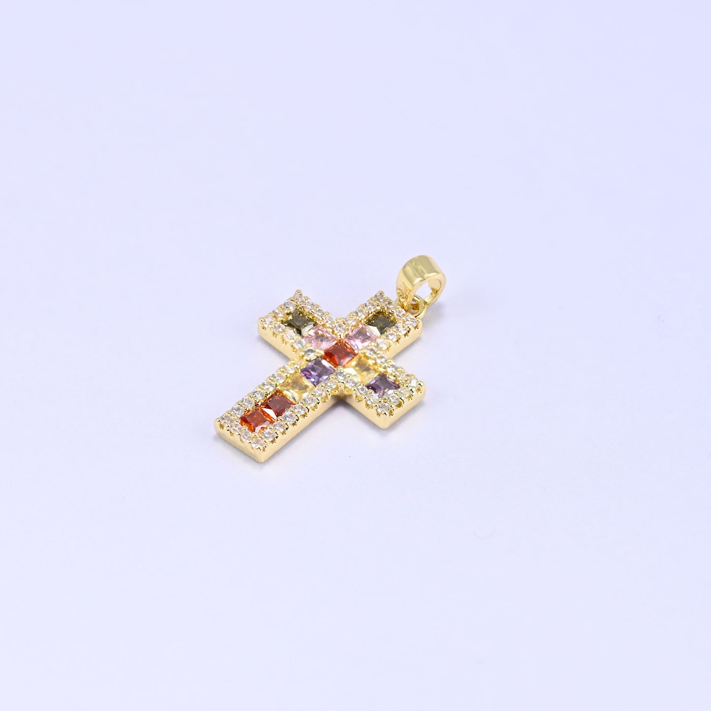 Zirconia cross charm in 18K gold plated brass, sold as a single piece