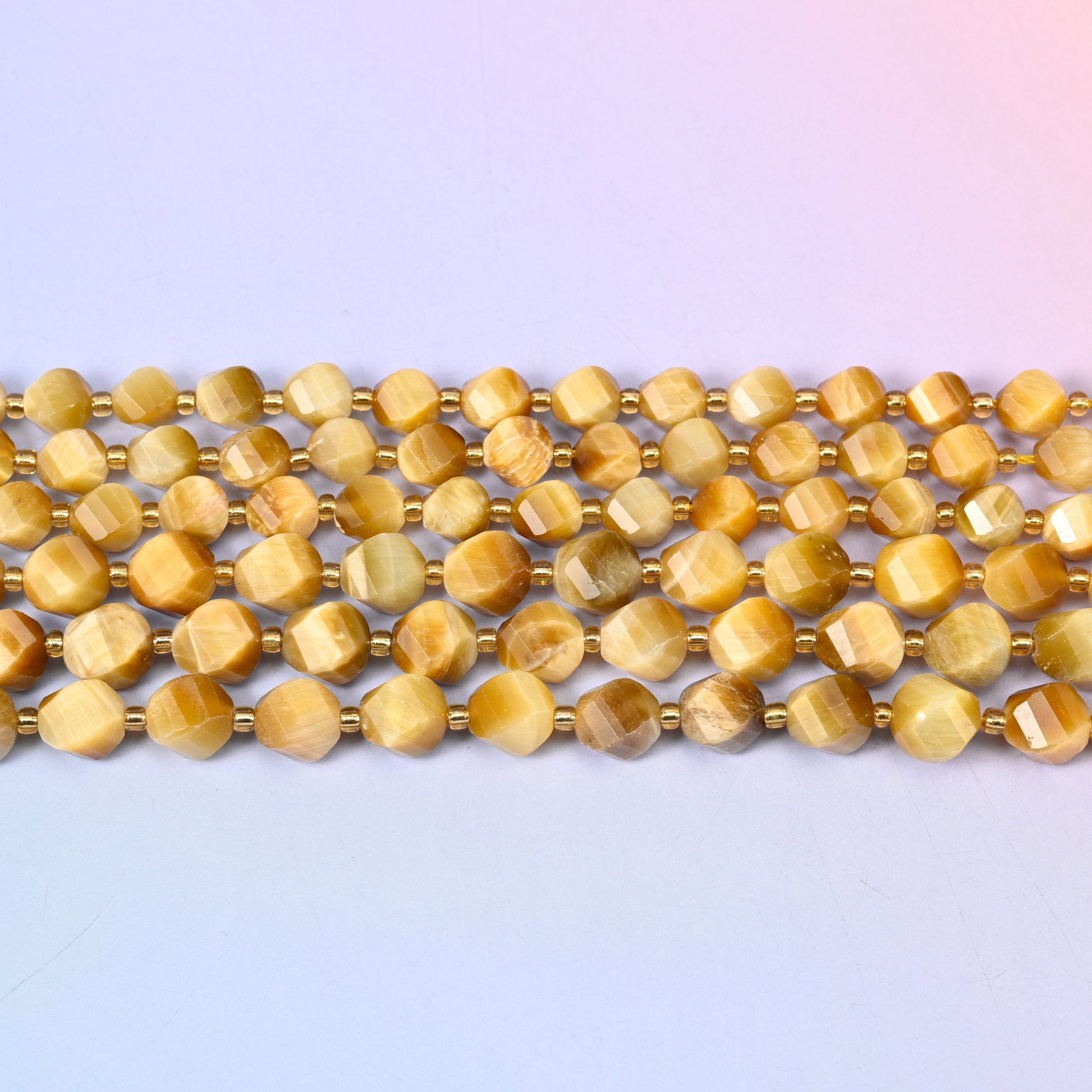 Gold Tiger Eye in pale honey and champagne gold with soft caramel banding