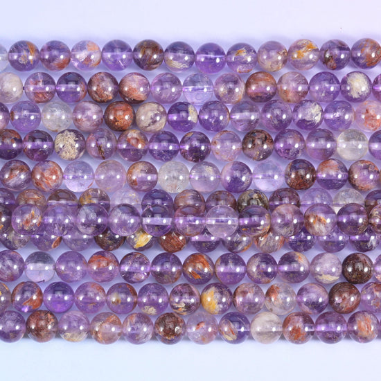 Smooth round cut Super 7 purple phantom quartz beads