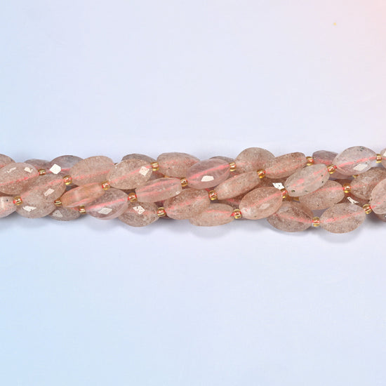 Strands of strawberry quartz faceted flat oval beads twisted together in a horizontal row