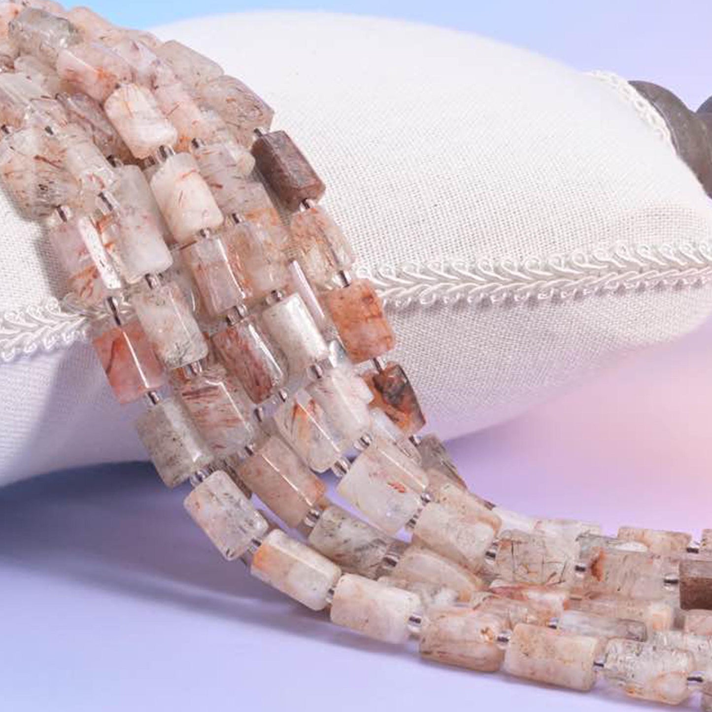 Natural Red Copper Rutilated Quartz faceted tube beads with visible copper-toned rutile inclusions