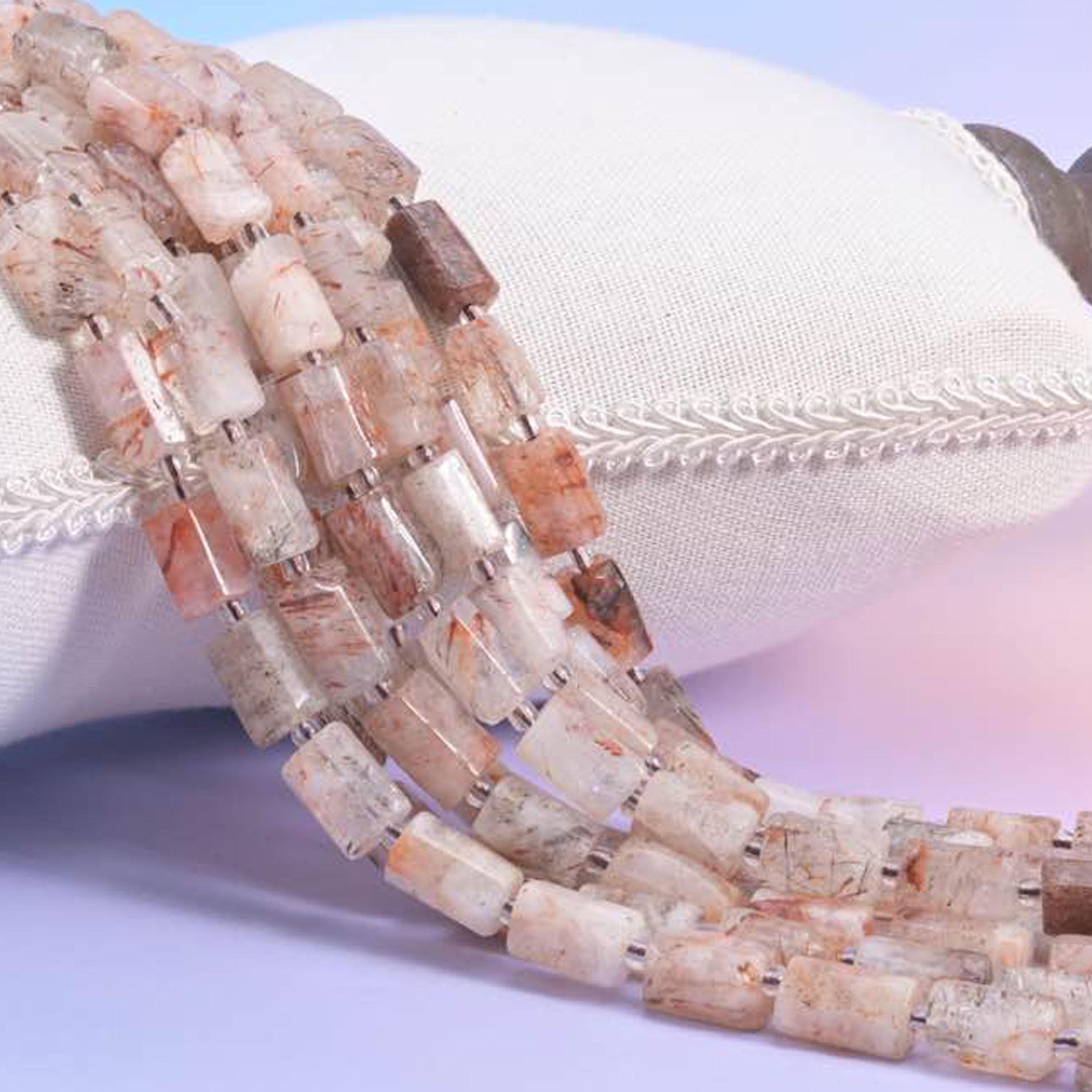 Natural Red Copper Rutilated Quartz faceted tube beads with visible copper-toned rutile inclusions