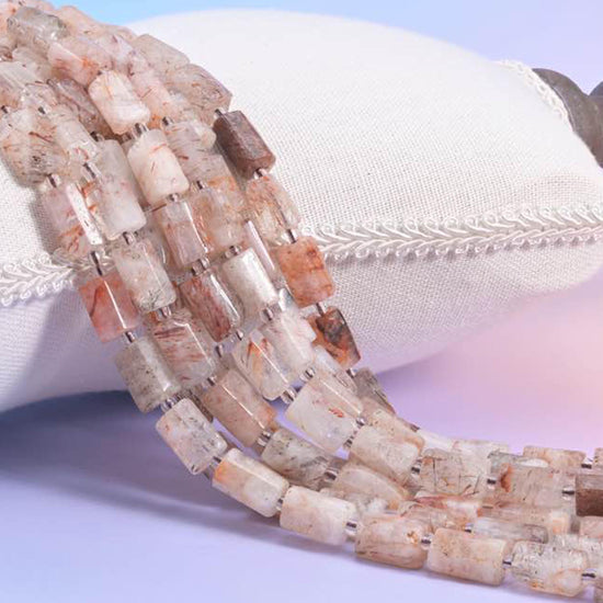 Natural Red Copper Rutilated Quartz faceted tube beads with visible copper-toned rutile inclusions