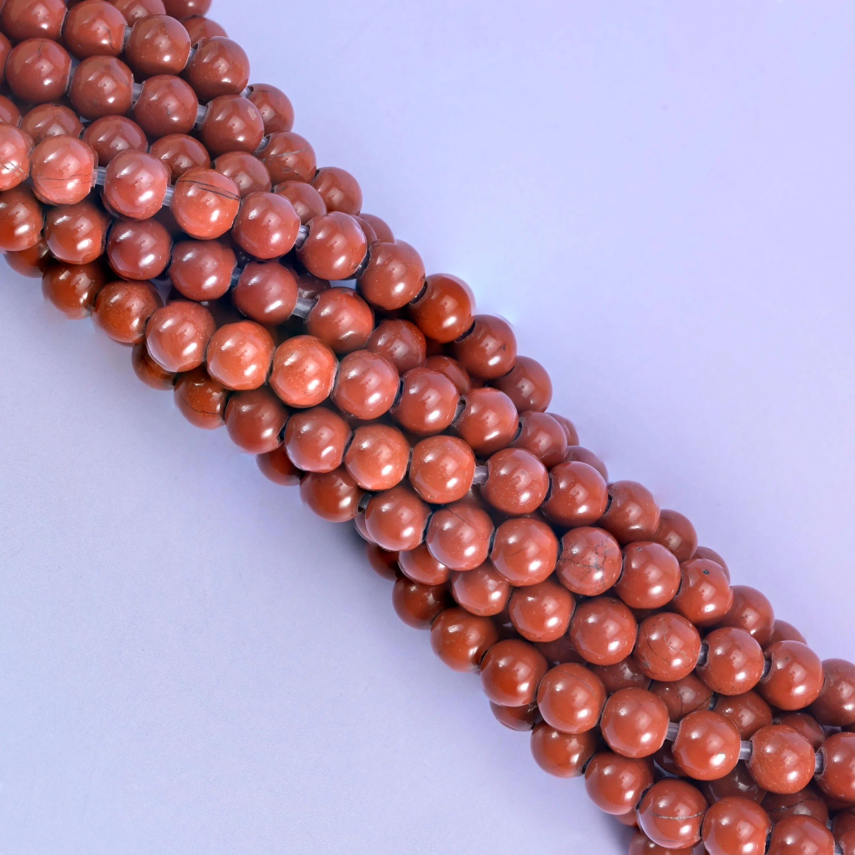 Smooth round cut red jasper beads