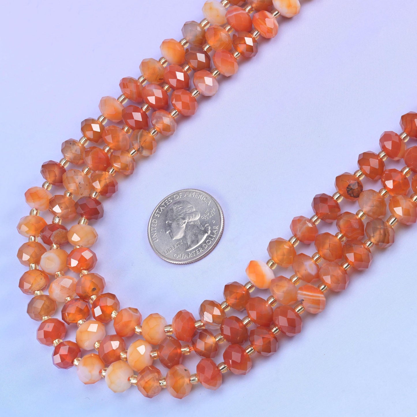 Dyed Red Stripe Agate Faceted Rondelle Beads in orange-red with cream banding